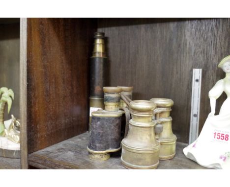 A pair of brass Ross Stereo Prism binoculars, no.60380,&nbsp;with broad arrow stamp; together with another pair of brass fiel
