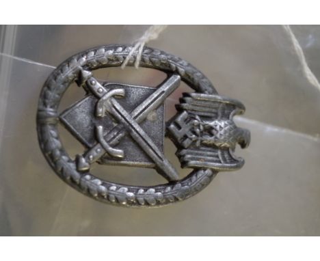 A World War II German Army Marksman's badge. 