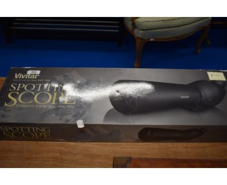 A Vivitar spotting scope in original box with tripod