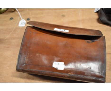 A Vintage Leather cast and fly wallet containing some casts and flies