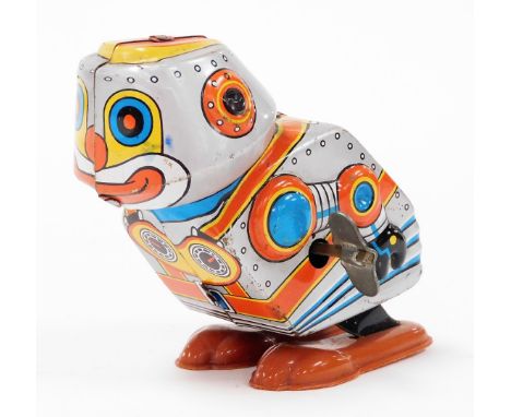 A 1970's Yone Japanese tin plate clockwork robot toy, no. 2097, with fixed key, 10cm high. 