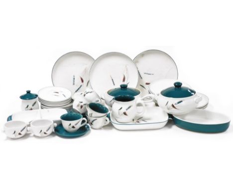 A Denby Greenwheat part dinner service, comprising two tureens, three serving dishes, five cups and saucers, two soup bowls, 