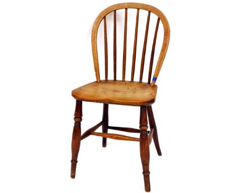 Amos (Grantham). A 19thC ash and elm hoop back Windsor chair, with plain stick back, shaped seat, single ring turned front le