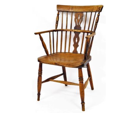 G Wilson (Grantham). A 19thC Windsor chair of small proportion, with curved cresting rail, pierced back splat and plain turni