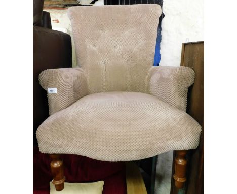 A button back nursing chair, with carved and shaped handles, on deep seat, on turned mahogany legs, in modern upholstery, 86c