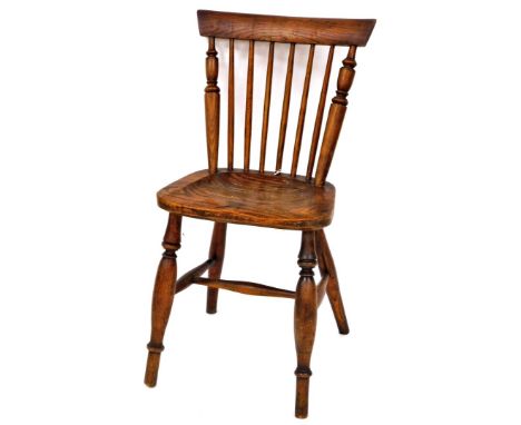 Wilson (Grantham). A 19thC ash and elm open chair, with fixed cresting rail, turned spindles, shaped seat, and single ring tu