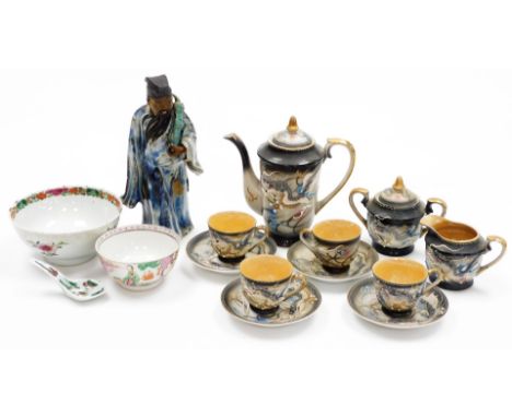 A group of Oriental ceramics, to include a Chinese Ming style pottery figure of a standing bearded sage, in flowing robes, pa