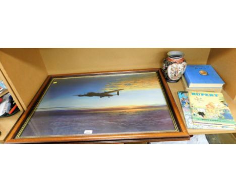 A small group of pictures and books, comprising A after Coulson framed print of The Hurrican, in oak frame, three Rupert annu