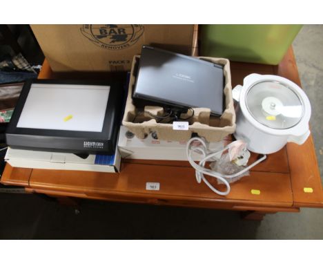 A Logic DVD player; slow cooker and a light box