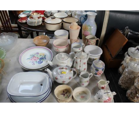 A collection of decorative china to include two Poole pottery dishes and enamel ware together with a collection of table glas