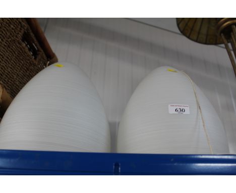 A pair of opaque glass light shades