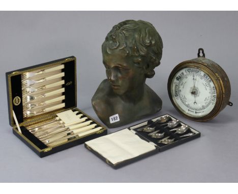 An early 20th century wall barometer in a metal case, 20cm diameter; together with a composition bust; a set of six silver te