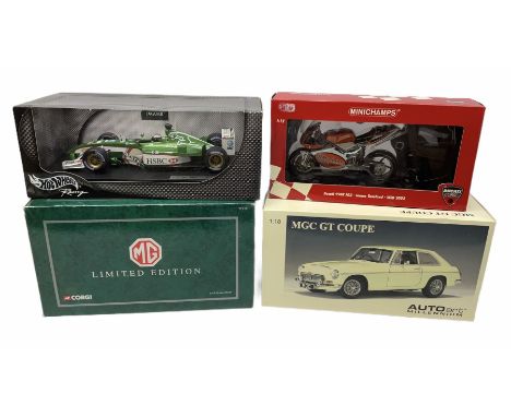Three 1:18 scale die-cast model cars - AUTOart Millenium MGC GT Coupe, Corgi limited edition 1963 MGB Roadster with stand and
