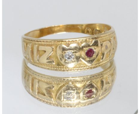 An antique 18ct gold diamond and ruby MIZAPAH ring, hallmarked 18ct gold, London, sponsor and date rubbed, gross weight 3.8g,