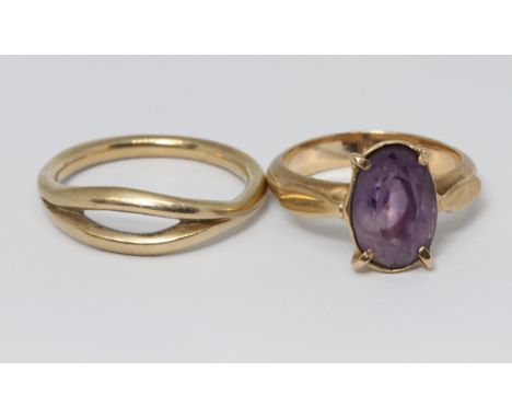 Two unmarked rings, one set with an amethyst, gross weight 7.4g.  