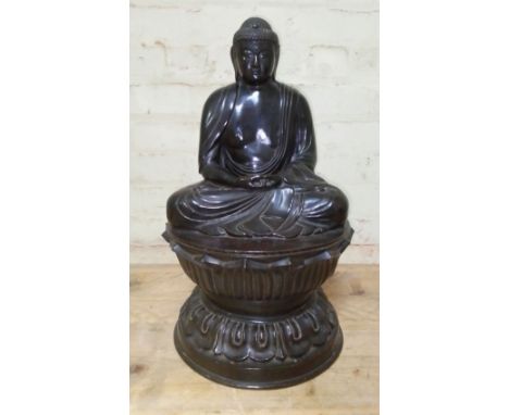 A bronze Buddha, 18th/19th century, round lotus base, Chinese characters to inside foot rim, height 52cm.  