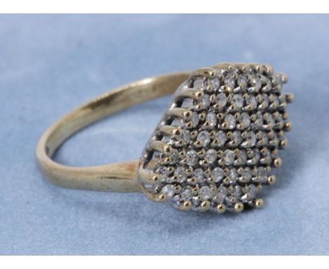 A 9ct gold diamond cluster ring, gross weight 3.8g, size K.  