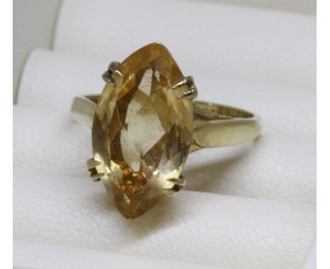 A hallmarked 9ct gold ring set with a marquise cut citrine, gross weight 3.2g, size J/K.  