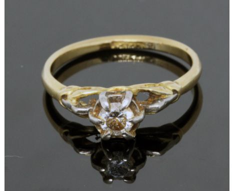 A single stone diamond ring, indistinctly marked, gross wt. 2.4g, size K.  