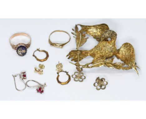 A mixed lot of jewellery comprising a ring marked '14K' weight 2.2g, a dolphin ring marked '9ct', a pair of earrings marked '