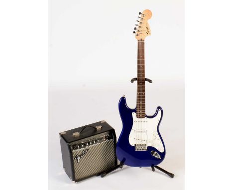 A Fender Squier Affinity Series Stratocaster in blue /purple finish with maple and rosewood neck, with a Ritter gig bag; and 