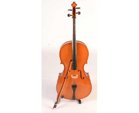 A Reghin Romanian Musikinstrumentfabrik full-size Cello, with light amber varnish, rosewood pegs, length of back 77cms, with 