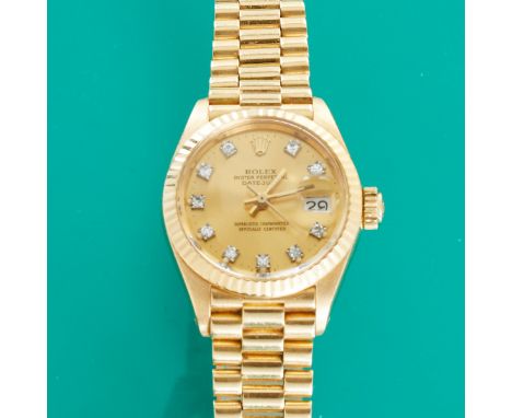 Rolex-DamenarmbanduhrFa. Rolex, Swiss. Modell: Lady-Datejust. 750/- Gelbgold, gestemp. Gewicht: 66,5 g. 10 Diamanten im 8/8el