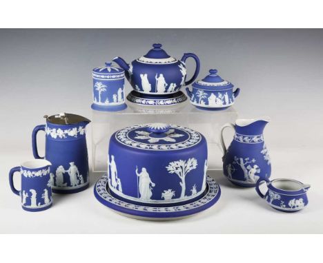 A group of Wedgwood dark blue dip Jasperwares, late 19th and early 20th century, each typically sprigged with Classical figur