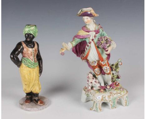 A Chelsea Derby porcelain figure of a Dresden Shepherd, circa 1765, modelled as a standing gentleman with a basket of grapes 