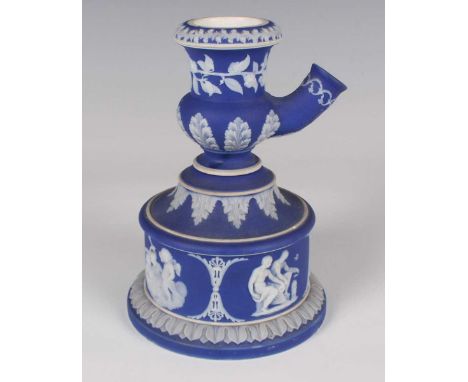 A Wedgwood dark blue Jasper dip white stoneware Staite's Patent tobacco pipe and stand, circa 1849, the circular base sprigge