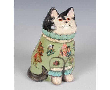 A Joan and David De Bethel Rye pottery cat, dated 1995, typically modelled seated, its pale green clothing with découpage chi