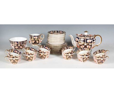 A Royal Crown Derby Japan 2451 pattern service, dated 1919 to 1922, comprising twelve teacups and saucers, twelve tea plates,