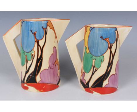 A graduated pair of Art Deco Clarice Cliff Fantasque Blue Autumn pattern conical jugs, circa 1930, black printed and incised 