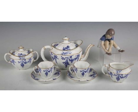 A Royal Crown Derby blue floral printed tea for two, pattern No. 3348, dated 1897, comprising teapot and cover, sucrier and c