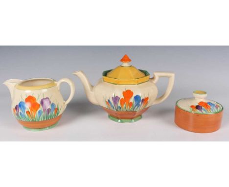 Three pieces of Clarice Cliff Bizarre painted in the Autumn Crocus pattern, comprising an Athens shape teapot and cover, a Wi