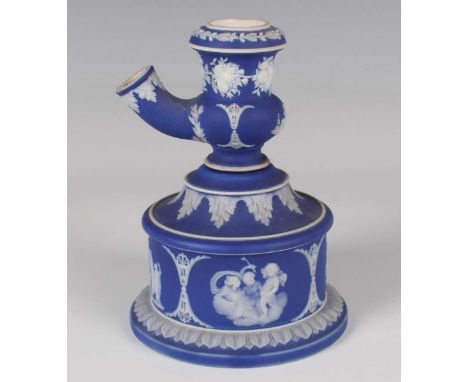 A Wedgwood dark blue Jasper dip white stoneware Staite's Patent tobacco pipe and stand, circa 1849, the circular base sprigge