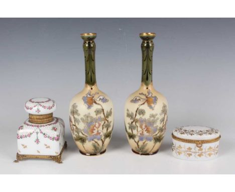 A pair of Art Nouveau Ernst Wahliss Austrian pottery bottle vases, early 20th century, decorated with gilt enriched flowers a