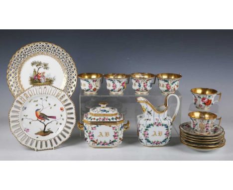 A harlequin Paris porcelain part service, mid 19th century, painted with flowers and gilt with foliage in a mix of patterns a