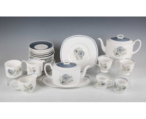 A Susie Cooper Glen Mist pattern part service, comprising two teapots and covers, twelve teacups and saucers, four coffee can