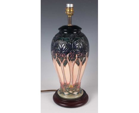 A Moorcroft Pottery Cluny pattern table lamp, designed by Sally Tuffin, with integral base, height to top of fitting 37cm, wi