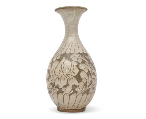Chinese Chizhou vase with scroll decoration on a grey ground    
