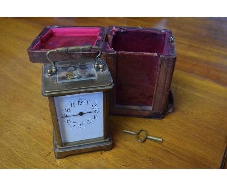 Victorian brass carriage clock in carrying case, 14cm high
