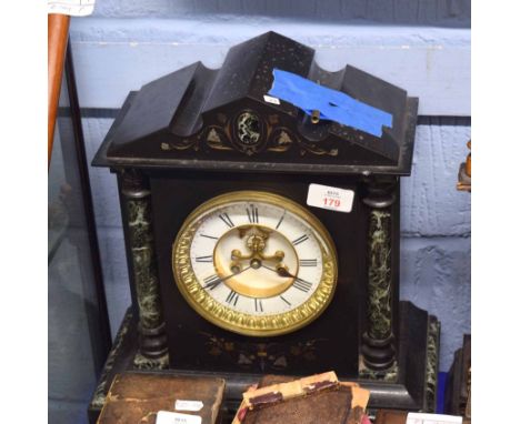 Victorian black marble mantel clock, broken arch top over circular Roman chapter ring, 39cm high