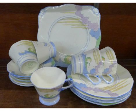 An Art Deco five setting tea service, cake plate and one cup a/f