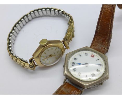 A lady's 9ct gold cased wristwatch and a silver cased wristwach lacking button