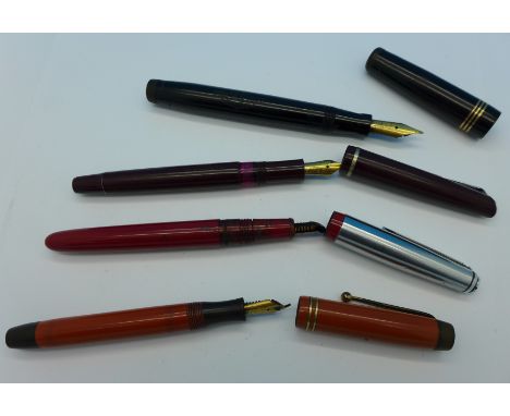 Three fountain pens with 14ct gold nibs, Parker, Mabie Todd and one other, and an Osmiroid pen, (4)