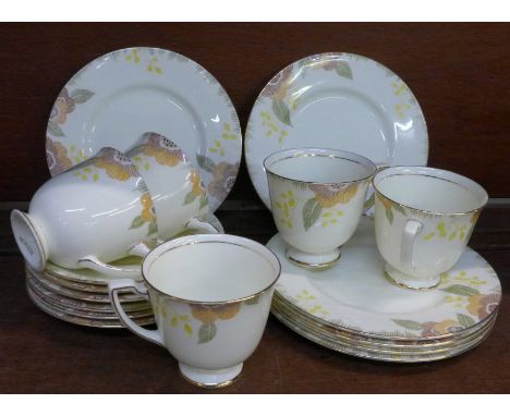 A Royal Doulton Nerissa tea set; five cups, six saucers and six plates