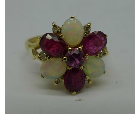 A 9ct gold, opal, ruby and diamond cluster ring, 3.3g, Q