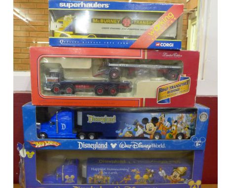 Four model lorries, two Corgi and two Disneyland
