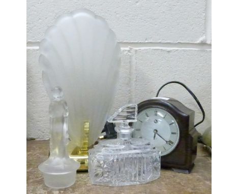 A Smiths Bakelite electric clock, an Art Deco scent bottle, an Art Deco style table lamp and a German Walther Sohne Art Deco 